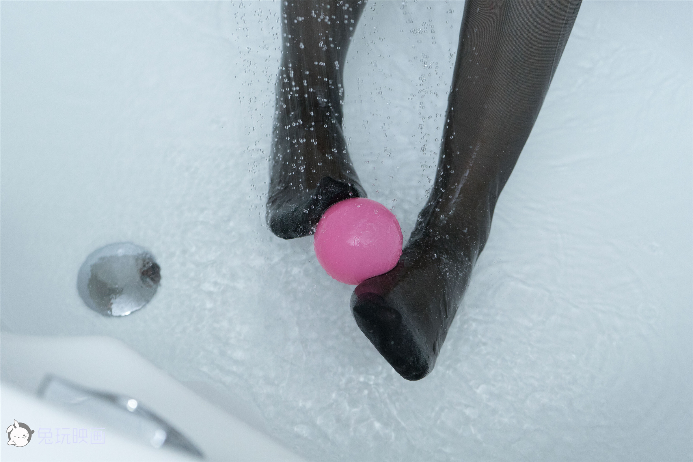 Playing with water in bathtub