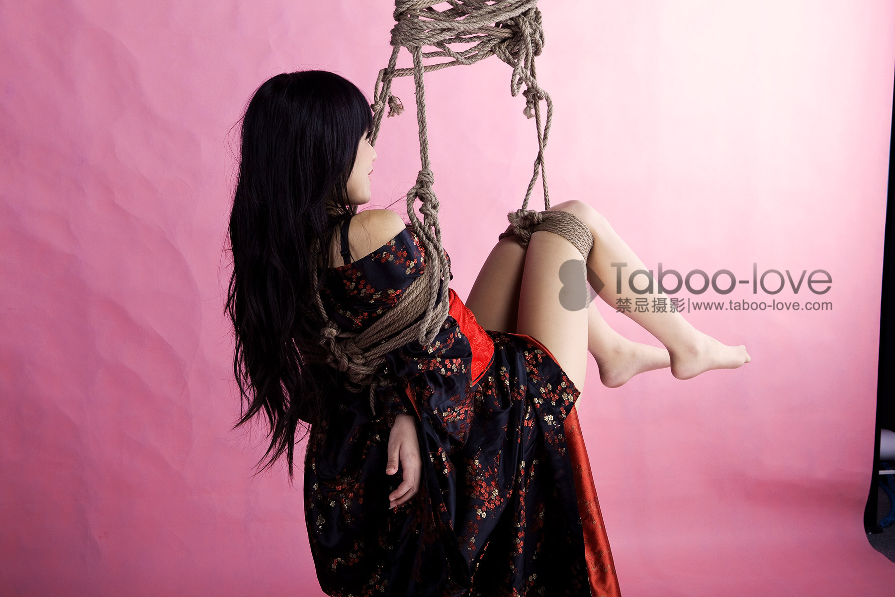 Japanese doll taboo love rope art in sunshine room