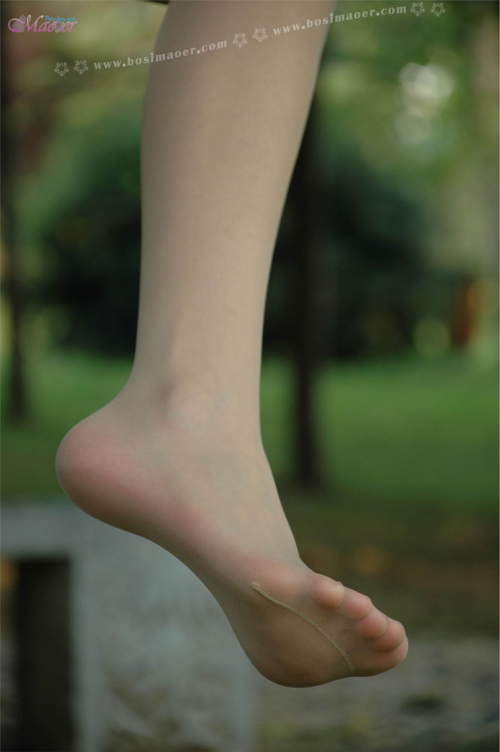Flesh colored silk stockings and beautiful feet